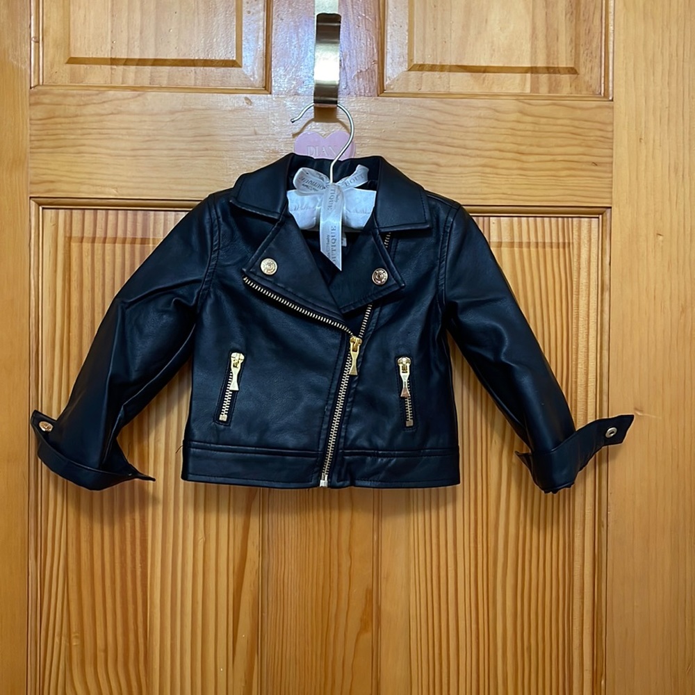Black jacket synthetic leather slightly worn perfect condition